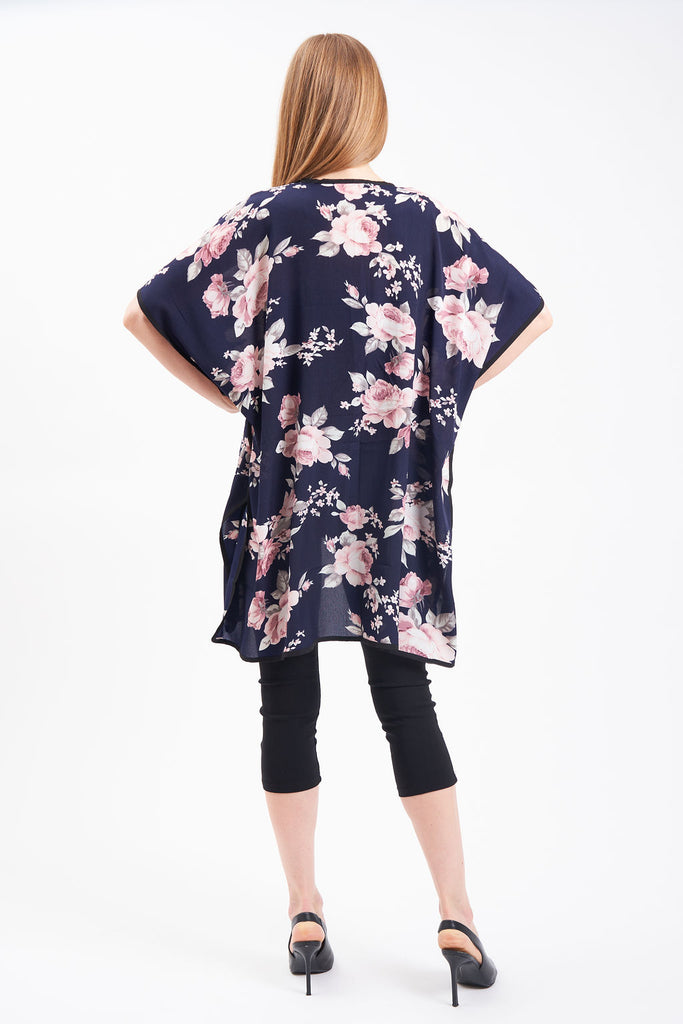 Kimono-style cover up with double slits and floral blossom design.