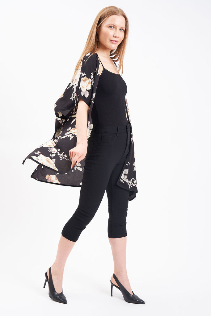 Kimono-style cover up with double slits and floral blossom design.