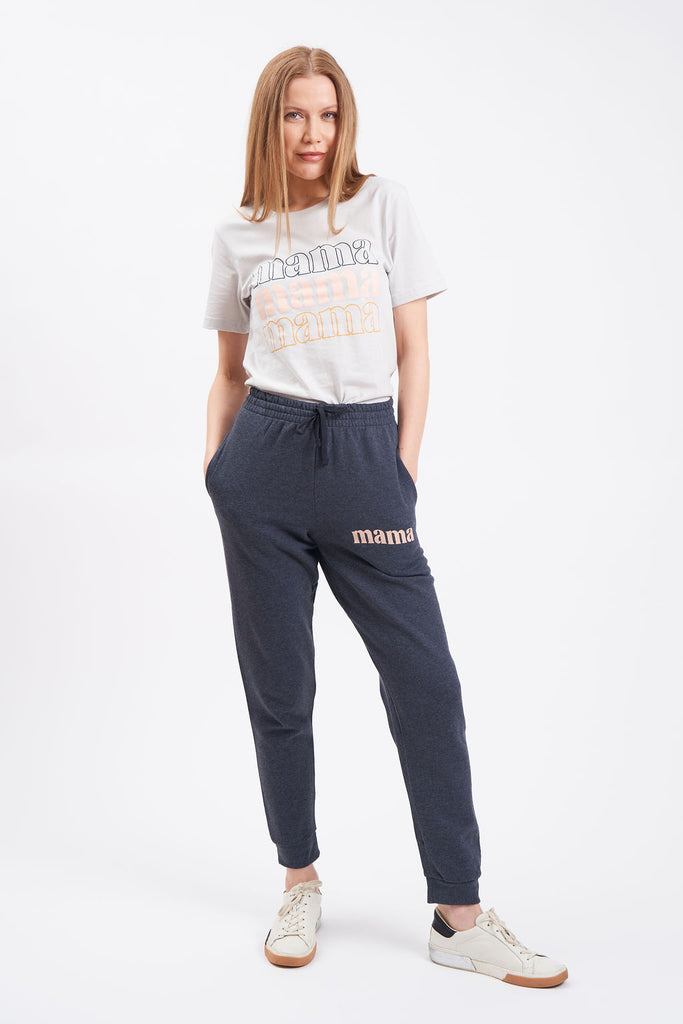 Gray women’s jogger sweatpants with “mama” text on upper thigh.