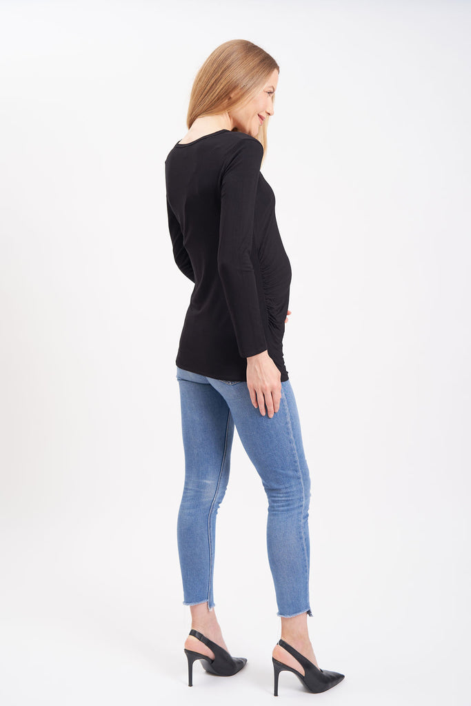 Long-sleeved, round neck plain maternity shirt with side ruching.