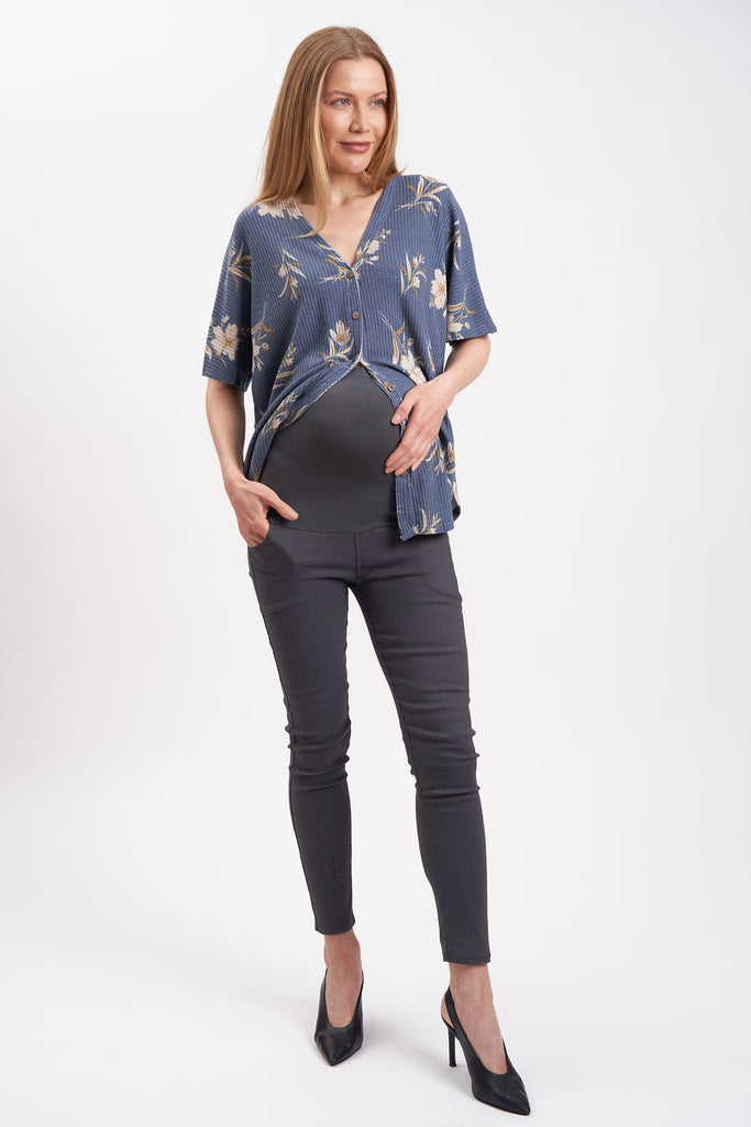 High-waist, over-the-belly maternity dress pants with tapered legs.