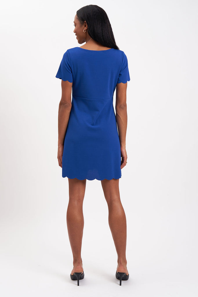 Maternity dress with scallop detailing on the hem and sleeves.