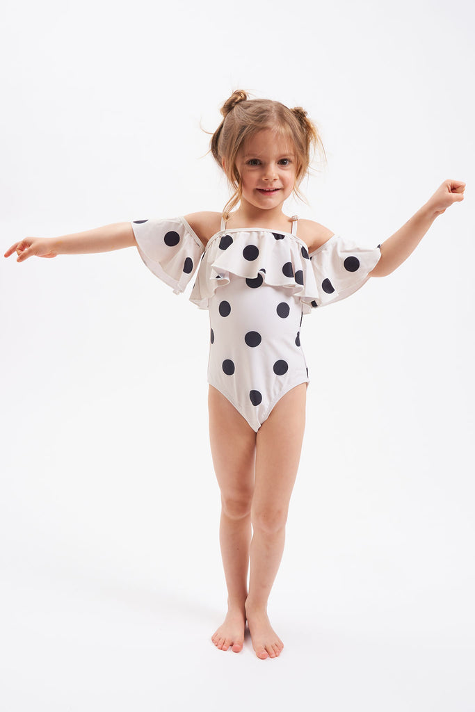 Little girl black and white polka dotted swimsuit