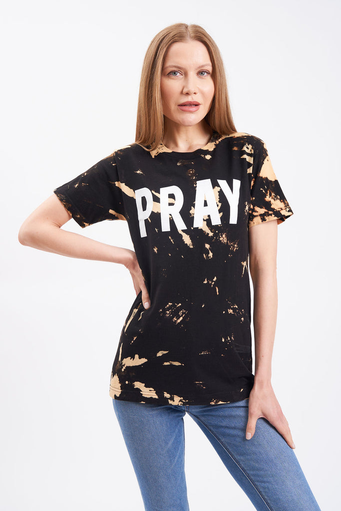 Graphic women’s t-shirt with printed “Pray” lettering.