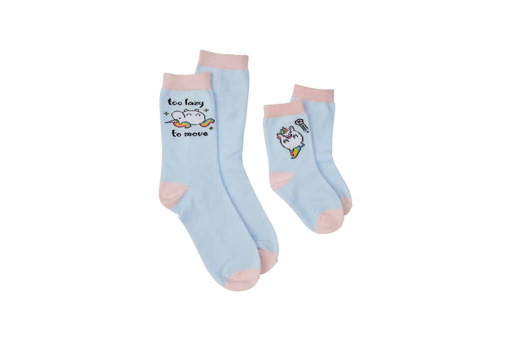 Sky blue women’s socks with a reclined unicorn and text that says “Too Lazy to Move” and kid’s sky blue socks with a happy, peppy unicorn.