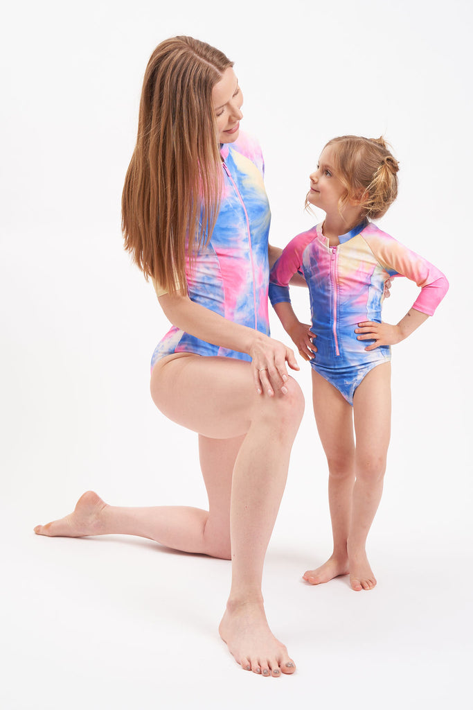 Tie-dye little girl rash guard swimming suit with zipper down front.